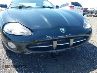 2002 Jaguar XK with VIN SAJDA42C12NA30499, listed as a IAAI auction lot 41954577 with 77,152 mi miles and . Bid and sale history available at DreamBid. Image 12.