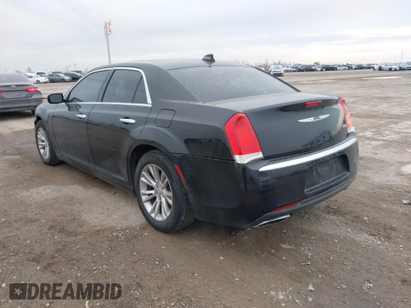 2016 Chrysler 300 with VIN 2C3CCAEG5GH333935, listed as a IAAI auction lot 41433834 with 131,524 mi miles. Bid and sale history available at carsss.com. Image 3.