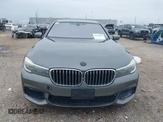 2016 BMW 7 Series 740i with VIN WBA7E2C56GG546920, listed as a IAAI auction lot 41610698 with 119,689 mi miles. Bid and sale history available at carsss.com. Image 12.