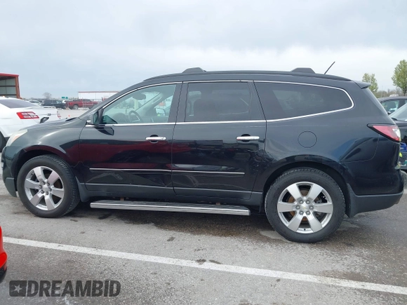 2014 Chevrolet Traverse LTZ with VIN 1GNKRJKD1EJ203282, listed as a IAAI auction lot 41984380 with 219,819 mi miles and . Bid and sale history available at DreamBid. Image 14.