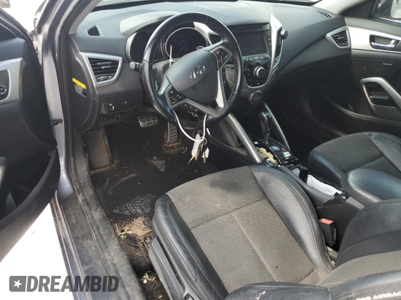 2014 Hyundai Veloster with VIN KMHTC6AD2EU216209, listed as a Copart auction lot 68901093 with 106,189 mi miles and Salvage title. Bid and sale history available at DreamBid. Image 8.