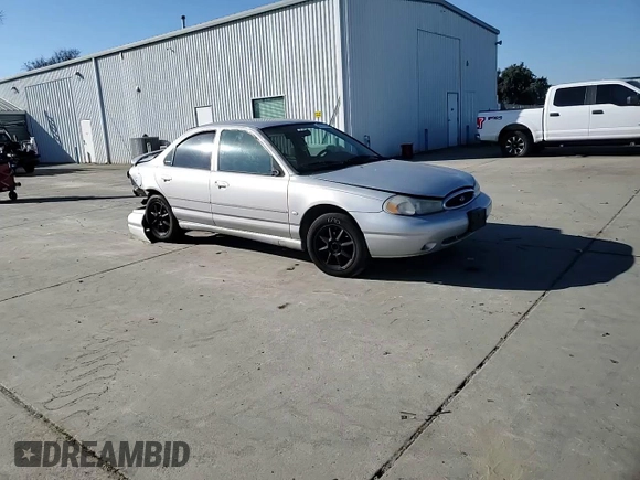 1998 Ford Contour z VIN 3FAFP66L8WM142974, wystawiony jako Copart lot #42175265 z przebiegiem 195 277 mil mil oraz Szkoda całkowita • Salvage title. Historia ofert i sprzedaży dostępna na DreamBid. Obrazek 11.