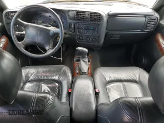 1998 Oldsmobile Bravada z VIN 1GHDT13W9W2718457, wystawiony jako Copart lot #55341755 z przebiegiem 133 968 mil mil oraz Tytuł czysty. Historia ofert i sprzedaży dostępna na DreamBid. Obrazek 8.
