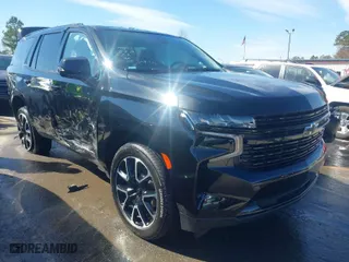 2023 Chevrolet Tahoe RST with VIN 1GNSKRKL2PR244986, listed as a IAAI auction lot 41571368 with 47,646 mi miles. Bid and sale history available at carsss.com. Image 1.