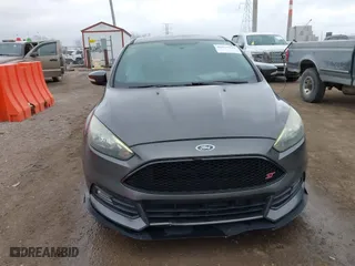 2015 Ford Focus ST with VIN 1FADP3L93FL321830, listed as a IAAI auction lot 41835529 with 106,901 mi miles. Bid and sale history available at carsss.com. Image 12.
