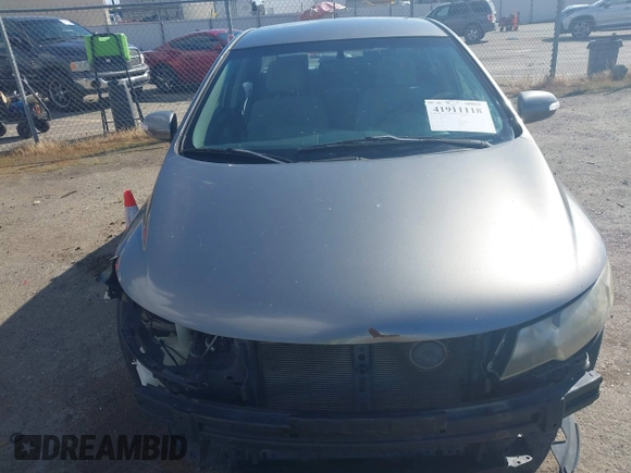 2010 Kia Forte EX with VIN KNAFU4A28A5229372, listed as a IAAI auction lot 41911118 with 166,084 mi miles. Bid and sale history available at carsss.com. Image 17.