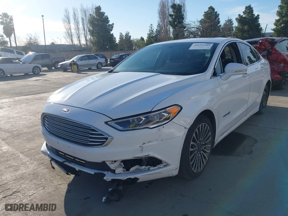 2018 Ford Fusion Hybrid Titanium with VIN 3FA6P0RU1JR116844, listed as a IAAI auction lot 41692389 with 153,031 mi miles. Bid and sale history available at carsss.com. Image 18.