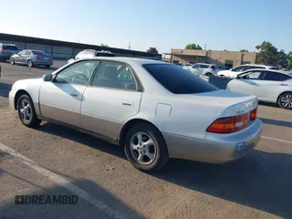 1997 Lexus ES 300 z VIN JT8BF22G5V0060245, wystawiony jako IAAI lot #42368851 z przebiegiem 241 736 mil mil oraz . Historia ofert i sprzedaży dostępna na DreamBid. Obrazek 3.