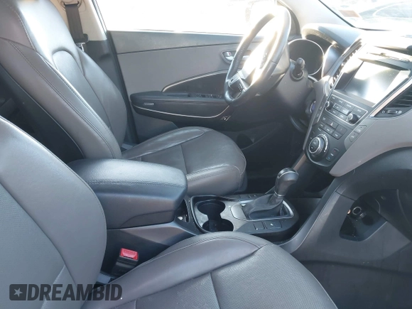 2017 Hyundai Santa Fe 2.4L z VIN 5XYZU3LB4HG435992, wystawiony jako IAAI lot #40927607 z przebiegiem 104 868 mil mil oraz . Historia ofert i sprzedaży dostępna na DreamBid. Obrazek 5.