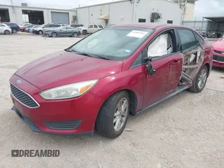 2016 Ford Focus SE with VIN 1FADP3F29GL314851, listed as a IAAI auction lot 41881982 with 130,888 mi miles. Bid and sale history available at carsss.com. Image 2.