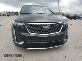 2021 Cadillac XT6 Premium Luxury z VIN 1GYKPCRS1MZ169952, wystawiony jako Copart lot #51908895 z przebiegiem 31 834 mil mil oraz Szkody całkowita. Historia ofert i sprzedaży dostępna na DreamBid. Obrazek 5.