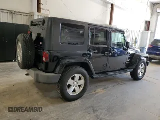 2008 Jeep Wrangler Unlimited Sahara with VIN 1J4GA59108L637009, listed as a Copart auction lot 63333705 with 181,778 mi miles and Clean title. Bid and sale history available at DreamBid. Image 3.
