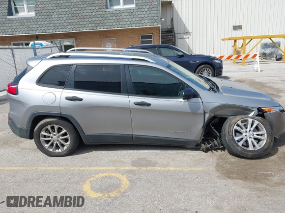 2015 Jeep Cherokee Sport with VIN 1C4PJLAB2FW696010, listed as a IAAI auction lot 42032956 with 88,323 mi miles. Bid and sale history available at carsss.com. Image 13.
