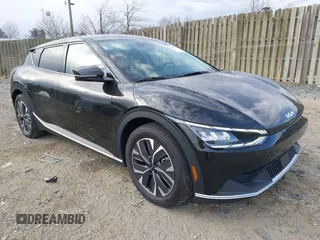 2024 Kia EV6 Wind z VIN KNDC3DLCXR5205276, wystawiony jako IAAI lot #41783515 z przebiegiem 9 061 mil mil oraz . Historia ofert i sprzedaży dostępna na DreamBid. Obrazek 1.