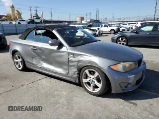 2012 BMW 1 Series 128i with VIN WBAUN1C5XCVR00151, listed as a Copart auction lot 56040445 with 171,302 mi miles and Salvage title. Bid and sale history available at DreamBid. Image 4.