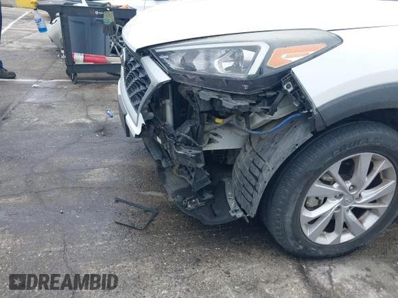 2019 Hyundai Tucson SE with VIN KM8J23A48KU026984, listed as a IAAI auction lot 41767118 with 72,647 mi miles. Bid and sale history available at carsss.com. Image 6.