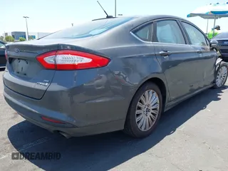 2015 Ford Fusion SE Hybrid with VIN 3FA6P0LU4FR305908, listed as a IAAI auction lot 42539627 with 91,467 mi miles and . Bid and sale history available at DreamBid. Image 4.