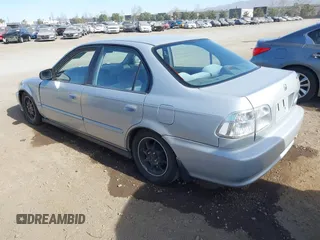 2000 Honda Civic VP with VIN 2HGEJ6616YH581681, listed as a IAAI auction lot 41392947 with 138,022 mi miles. Bid and sale history available at carsss.com. Image 3.