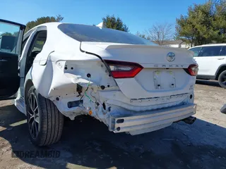 2023 Toyota Camry SE z VIN 4T1G11BK2PU076186, wystawiony jako IAAI lot #41602143 z przebiegiem 18 307 mil mil oraz . Historia ofert i sprzedaży dostępna na DreamBid. Obrazek 6.