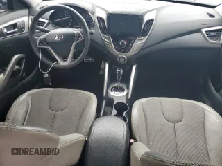 2012 Hyundai Veloster w/Black Int z VIN KMHTC6AD1CU030478, wystawiony jako Copart lot #62715005 z przebiegiem 127 625 mil mil oraz Szkoda całkowita • Salvage title. Historia ofert i sprzedaży dostępna na DreamBid. Obrazek 8.