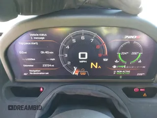 2018 McLaren 720S z VIN SBM14DCA1JW000891, wystawiony jako IAAI lot #41431972 z przebiegiem 23 724 mil mil oraz . Historia ofert i sprzedaży dostępna na DreamBid. Obrazek 7.