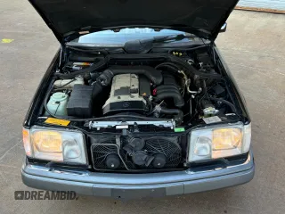 1995 Mercedes-Benz E 320 with VIN WDBEA66E8SC239370, listed as a Copart auction lot 55871605 with 119,102 mi miles and Salvage Title. Bid and sale history available at DreamBid. Image 5.