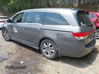 2015 Honda Odyssey Touring Elite with VIN 5FNRL5H93FB106046, listed as a IAAI auction lot 42492096 with 197,575 mi miles and . Bid and sale history available at DreamBid. Image 3.