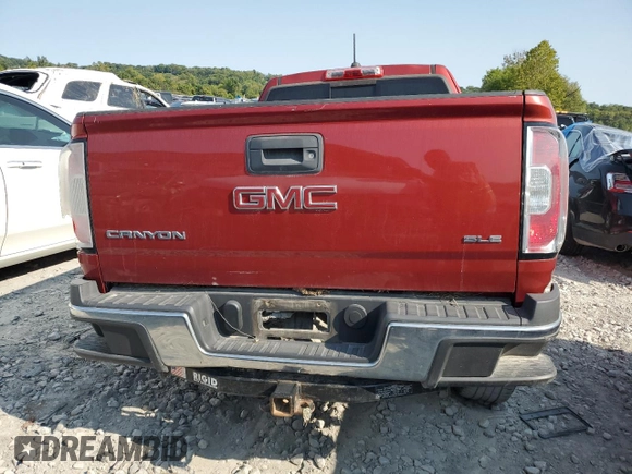 2015 GMC Canyon 2WD SLE with VIN 1GTH5BEA0F1190810, listed as a Copart auction lot 69724194 with 238,397 mi miles and Salvage Title. Bid and sale history available at carsss.com. Image 6.