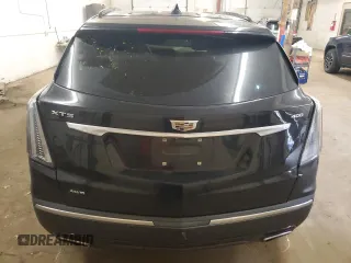 2021 Cadillac XT5 AWD Sport with VIN 1GYKNHRS1MZ103033, listed as a Copart auction lot 58586425 with 65,229 mi miles and Salvage title. Bid and sale history available at DreamBid. Image 6.
