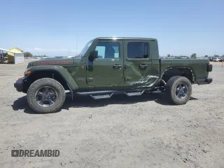 2022 Jeep Gladiator Rubicon z VIN 1C6JJTBGXNL155407, wystawiony jako Copart lot #57522915 z przebiegiem 12 809 mil mil oraz Szkoda całkowita • Salvage title. Historia ofert i sprzedaży dostępna na DreamBid. Obrazek 1.