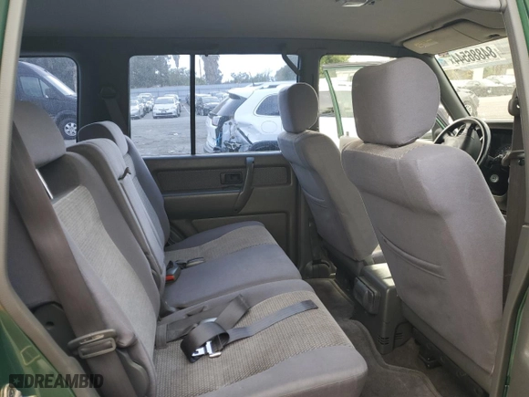 1998 Isuzu Trooper S with VIN JACDJ58X8W7908238, listed as a Copart auction lot 84886544 with 154,359 mi miles and Salvage Title. Bid and sale history available at carsss.com. Image 11.