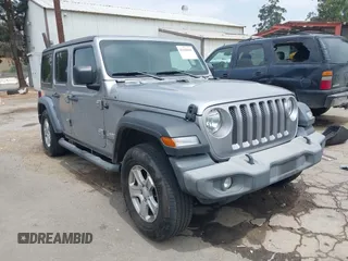 2018 Jeep Wrangler Unlimited Sport S with VIN 1C4HJXDN5JW145340, listed as a IAAI auction lot 42420695 with 92,500 mi miles and . Bid and sale history available at DreamBid. Image 1.