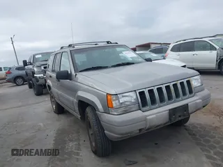 1998 Jeep Grand Cherokee Laredo with VIN 1J4FX58S6WC354101, listed as a IAAI auction lot 42158671 with 289,318 mi miles and . Bid and sale history available at DreamBid. Image 1.