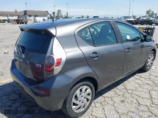 2013 Toyota Prius c One with VIN JTDKDTB36D1540801, listed as a IAAI auction lot 41966930 with 135,141 mi miles. Bid and sale history available at carsss.com. Image 4.