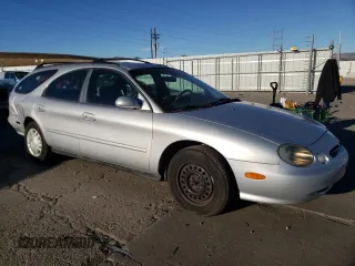 1999 Ford Taurus SE with VIN 1FAFP58U5XG240517, listed as a Copart auction lot 83514044 with 101,092 mi miles and Clean title. Bid and sale history available at DreamBid. Image 4.