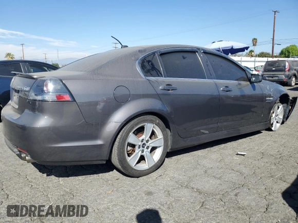 2009 Pontiac G8 GT with VIN 6G2EC57Y19L215718, listed as a Copart auction lot 77231714 with 57,515 mi miles and Salvage Title. Bid and sale history available at carsss.com. Image 3.