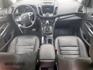2015 Ford Escape Titanium z VIN 1FMCU9J94FUB09903, wystawiony jako Copart lot #59922275 z przebiegiem 132 243 mil mil oraz Czysty tytuł • Clean title. Historia ofert i sprzedaży dostępna na DreamBid. Obrazek 8.