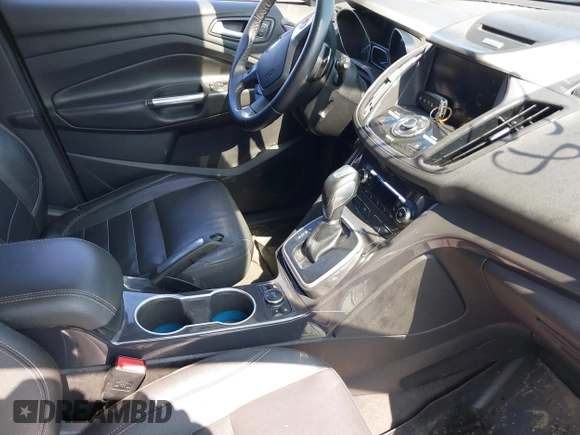 2014 Ford Escape Titanium with VIN 1FMCU9J99EUA75276, listed as a IAAI auction lot 42148537 with 163,330 mi miles and . Bid and sale history available at DreamBid. Image 5.