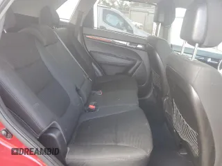 2014 Kia Sorento LX z VIN 5XYKT3A6XEG449692, wystawiony jako Copart lot #55324885 z przebiegiem 103 809 mil mil oraz Szkoda całkowita • Salvage title. Historia ofert i sprzedaży dostępna na DreamBid. Obrazek 11.