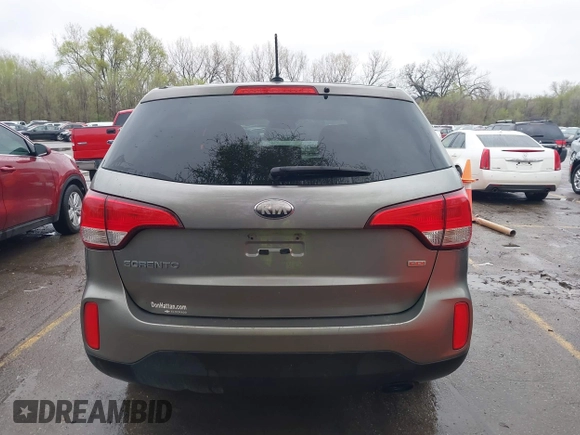 2014 Kia Sorento LX with VIN 5XYKT3A67EG477367, listed as a IAAI auction lot 41911249 with 172,320 mi miles and . Bid and sale history available at DreamBid. Image 17.