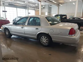 2005 Ford Crown Victoria LX with VIN 2FAFP74W95X158705, listed as a IAAI auction lot 41593553 with 276,940 mi miles. Bid and sale history available at carsss.com. Image 14.
