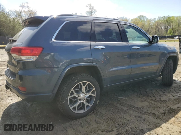 2020 Jeep Grand Cherokee Overland with VIN 1C4RJFCG7LC335839, listed as a Copart auction lot 52320505 with 86,684 mi miles and Salvage Title. Bid and sale history available at DreamBid. Image 3.