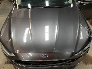 2017 Ford Fusion Hybrid SE z VIN 3FA6P0LU4HR226127, wystawiony jako Copart lot #50496455 z przebiegiem 98 027 mil mil oraz Szkoda całkowita • Salvage title. Historia ofert i sprzedaży dostępna na DreamBid. Obrazek 11.