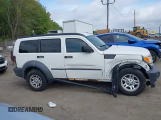 2007 Dodge Nitro SXT z VIN 1D8GU28K87W652037, wystawiony jako IAAI lot #42172950 z przebiegiem 172 487 mil mil oraz . Historia ofert i sprzedaży dostępna na DreamBid. Obrazek 13.