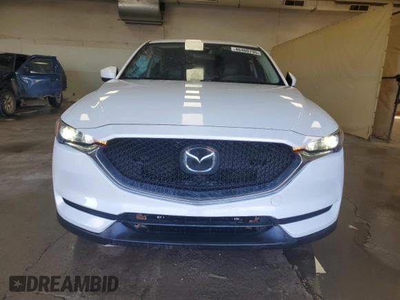 2019 Mazda CX-5 Touring with VIN JM3KFBCM1K0697500, listed as a Copart auction lot 46460735 with 69,412 mi miles and Salvage Title. Bid and sale history available at carsss.com. Image 5.