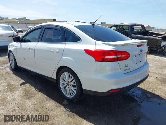 2015 Ford Focus Titanium с VIN 1FADP3J27FL341102, выставлен на аукционе IAAI как лот 41793450 с пробегом 96 465 миль миль и . История ставок и продаж доступна на DreamBid. Изображение 3.