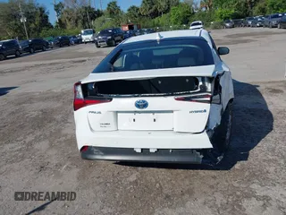2022 Toyota Prius L Eco with VIN JTDKAMFUXN3163123, listed as a IAAI auction lot 41666679 with 68,026 mi miles. Bid and sale history available at carsss.com. Image 16.
