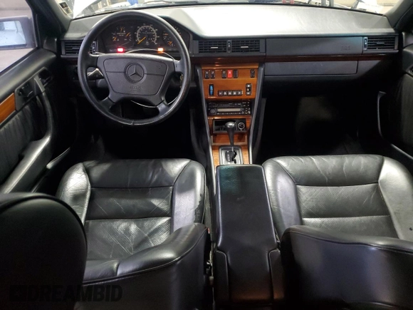 1995 Mercedes-Benz E 320 with VIN WDBEA32E2SC168493, listed as a Copart auction lot 82365704 with 102,066 mi miles and Salvage Title. Bid and sale history available at DreamBid. Image 8.