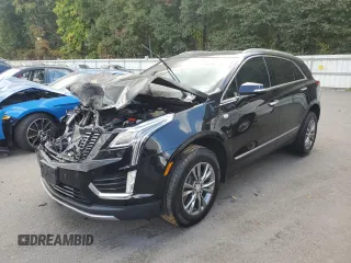 2021 Cadillac XT5 FWD Premium Luxury z VIN 1GYKNCR40MZ177676, wystawiony jako Copart lot #71796934 z przebiegiem Nie podano mil oraz Szkoda całkowita • Salvage title. Historia ofert i sprzedaży dostępna na DreamBid. Obrazek 1.