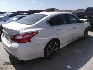 2016 Nissan Altima SR with VIN 1N4AL3AP0GC230628, listed as a IAAI auction lot 41780598 with 102,169 mi miles and . Bid and sale history available at carsss.com. Image 4.